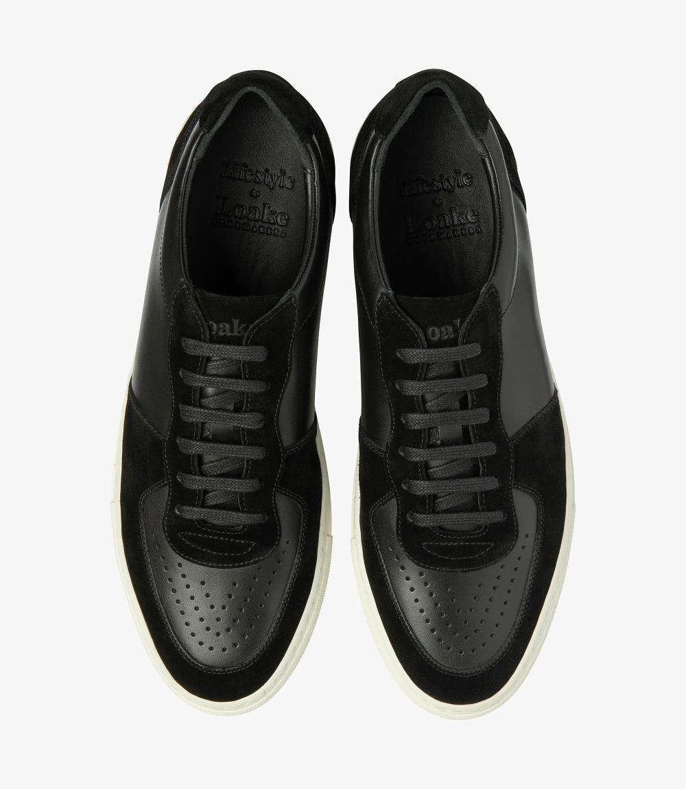 From above, the exquisite craftsmanship and attention to detail of the Loake Rush Black Sneakers are evident, with hand-painted calf leather and suede construction, making them a timeless addition to any wardrobe.