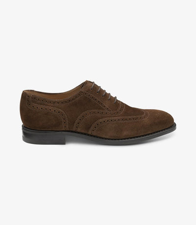 A side view of the Loake 302 Brown Leather Oxford Brogues, showcasing their sleek silhouette and polished leather finish. The suede detailing adds a touch of sophistication and texture to the design, while the Goodyear welted rubber soles ensure durability and traction.