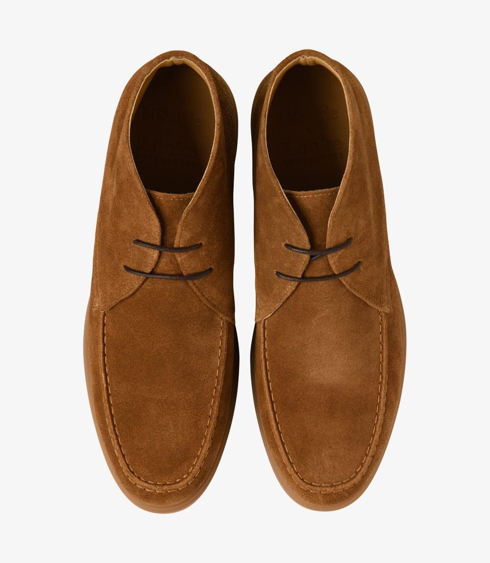 A bird's-eye view captures the symmetry and elegance of the Loake Amalfi Chestnut Suede Chukka Boots. The matching pair displays the sleek design and premium materials, making them a versatile choice for any casual ensemble.
