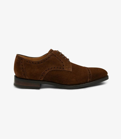 The outside profile of the Loake Eldon Brown Suede Derby Semi-Brogue showcases its sleek silhouette, featuring a straight toe-cap with subtle punched detailing, epitomizing classic sophistication in luxurious suede.