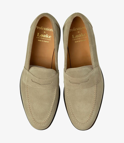 A bird's-eye view of the two Imperial Loafers showcases their balanced symmetry and understated charm, with their apron penny design and premium suede material, making them a versatile and stylish addition to any gentleman's wardrobe.