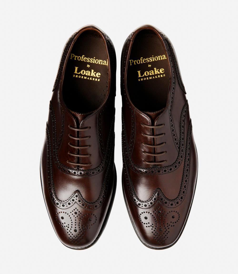 A top-down view of two Loake 302 Brown Leather Oxford Brogues, perfectly symmetrical in design and craftsmanship. The brogue patterns and smooth leather finish are visible, showcasing the timeless elegance of these classic shoes.