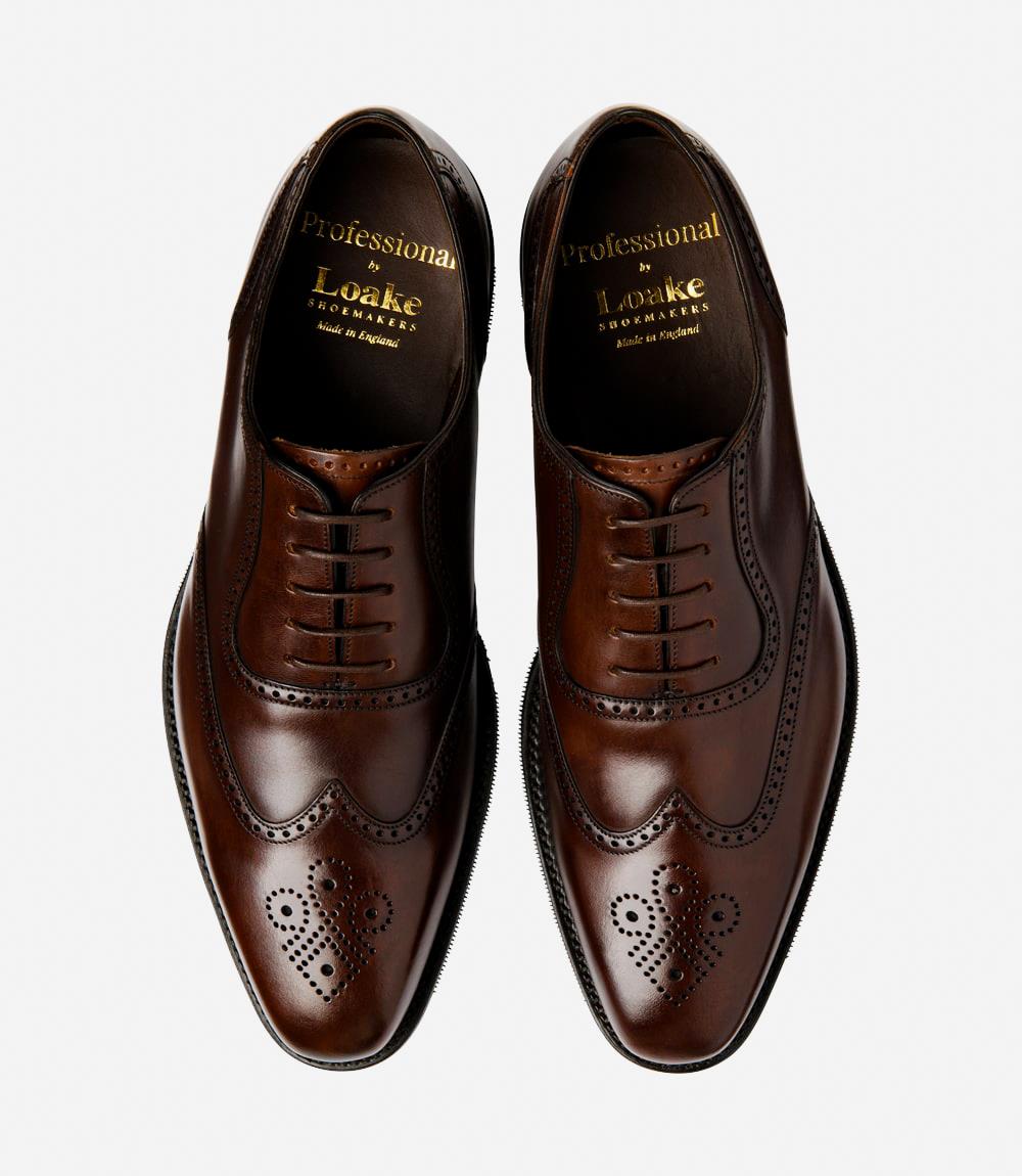 A bird's-eye view of the two Eldon shoes showcases their balanced symmetry and understated charm, with their semi-brogue design and polished finish, making them a versatile and stylish addition to any gentleman's wardrobe.