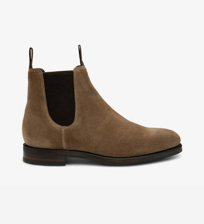 A side view of the Loake Emsworth Flint Suede Chelsea Boot, showcasing its sleek silhouette and premium suede leather upper. The Goodyear welted shadow rubber sole provides durability and traction, while the subtle chisel shape toe adds a touch of refinement.