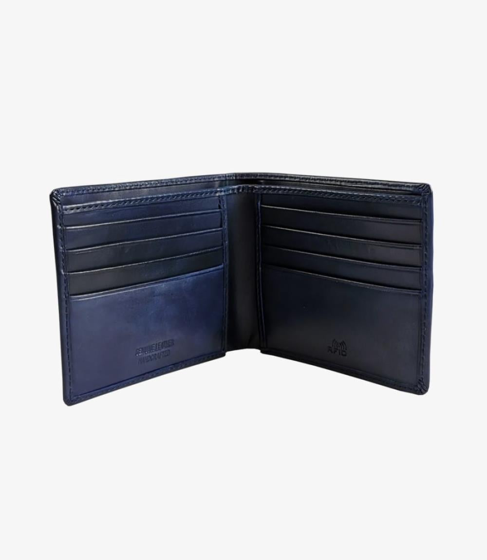 The wallet opens to reveal multiple organized card slots on each side, along with a spacious full-length section for notes. The interior is crafted from the same rich navy leather, showcasing fine craftsmanship with smooth lines and impeccable stitching for a polished, premium look.