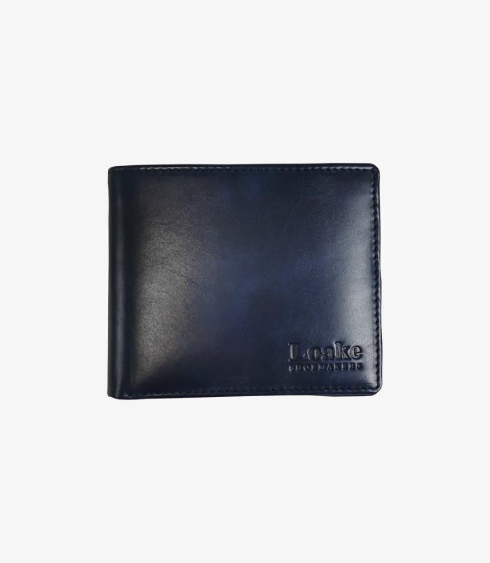 A sleek, navy leather wallet, compact and refined, with a smooth matte finish and subtle stitching along the edges. Its minimalistic design exudes sophistication, ideal for both formal and casual settings.
